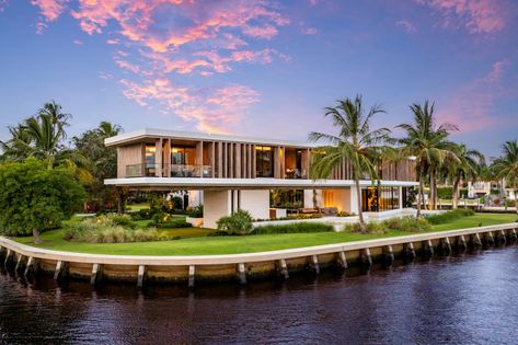 A modern waterfront mansion in Fort Lauderdale, Florida, hit the market in late August with a price tag just shy of $50 million, making it the second-priciest home for sale in the South Florida city.  Built with a cantilever design, the home appears to be floating above land. And with 740 feet of water frontage, this elevated design allows the home to capitalize on the surrounding views of the New River. Contemporary Mansion, Cantilever Design, Florida Mansion, Florida Homes For Sale, Destin Hotels, Florida City, Pickleball Court, Property Design, Floating House