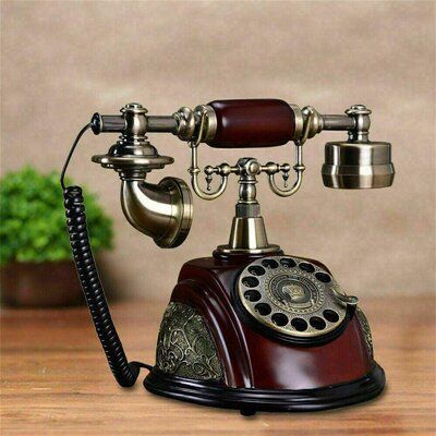 This rotating phone is designed with retro and luxury inspiration. The combination of retro styling and modern technology, which can be used as a phone, as well as as gifts and decorations, is a fashion choice. | Fleur De Lis Living Antique Style Rotary European Style Handset Dial Desk Telephone (Black & Wine Red), Size 8.27 H x 10.04 W x 6.5 D in | Wayfair | Black Friday / Cyber Monday Deals Old Fashioned Phone, Rotary Dial Phone, Antique Phone, Antique Telephone, Phones For Sale, Rotary Phone, Old Phone, Desk Phone, Vintage Electronics