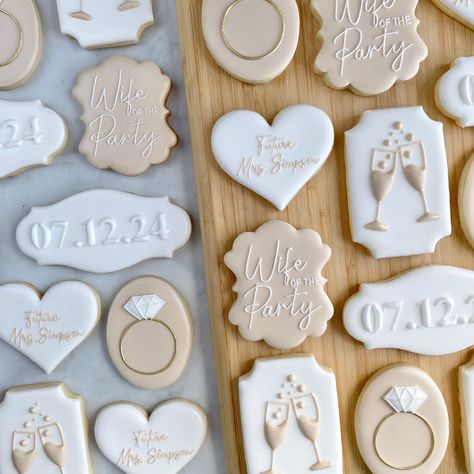 This listing is for 24 bachelorette cookies. All cookies range from 3" - 3.5". Other colour options are available upon request.  The set includes: 5 gold rings 5 wife of the party 5 wedding date (please add in personalization) 5 hearts with Future Mrs. __? (please add in personalization)  4 champagne glasses  Flavour: vanilla sugar cookies All cookies are hand crafted using fresh premium ingredients including home-made vanilla extract and are decorated with royal icing. All cookies are made fres She Said Yes Engagement Cookies, Anniversary Party Cookies, Royal Icing Engagement Cookies, Love Is Brewing Bridal Shower Cookies, Pearls And Prosecco Bridal Shower Theme Cookies, Dance Decorated Cookies, Save The Date Cookies Wedding, Simple Engagement Cookies, Wedding Themed Cookies