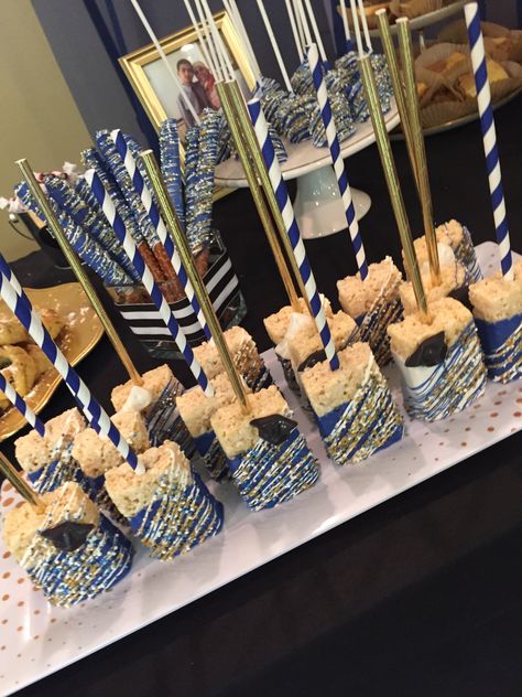 Grad Rice Krispies, Graduation Rice Crispy Treats, Rice Crispy Dipped In Chocolate, Blue And Gold Rice Krispie Treats, Chocolate Rice Krispie Treats Dipped, Rice Crispy Decorating Ideas, Graduation Rice Krispie Treats Ideas, Rice Krispie Treats Graduation, Graduation Rice Krispie Treats