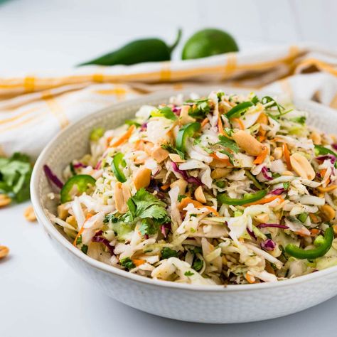 Asian Style Coleslaw Crunchy Asian Slaw, Asian Slaw Recipe, Asian Cabbage Salad, Asian Cabbage, Slaw Recipe, Asian Slaw, Easy Asian, Slaw Recipes, Main Dish Salads