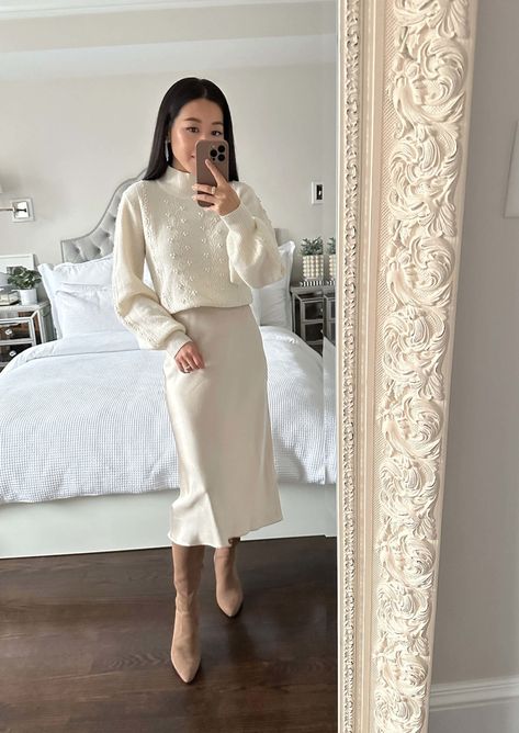 Sweater Silk Skirt Outfit, Slip Skirt Outfit Winter, Silk Skirt Outfit Winter, Silk Skirt And Sweater, Cream Skirt Outfit, Skirt Outfits With Boots, Slip Skirt Outfit, Skirt With Boots, Silk Skirt Outfit