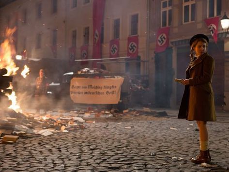 This particular scene is the book burning held in Munich. It is important because this is were Liesel steals her second book "The Shoulder Shrug" right out of the fire. This is also when she notices that the Mayor's wife saw her in the act. Massive Library, Book Burning, Book Thief, Portrait References, Markus Zusak, Jewish Books, Fahrenheit 451, Stefan Zweig, Fire Book