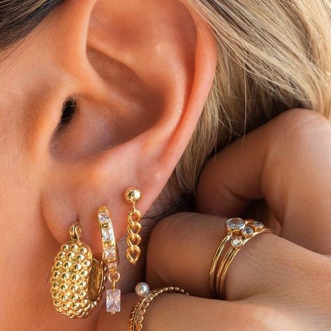 The summer is 2021. You’re wearing new BBT earrings and rings while sipping on an Aperol Spritz poolside. Life is good 🥂 HEAT WAVES dropping tomorrow at 10 am PST 🌞 #Regram via @COlIMF8FWbS Chunky Earring Stack, Earring Stacks Gold, Jewelry Combos, Chunky Gold Earrings, Jewelry Guide, Jewelry Stack, Earring Stack, Bali Earrings, Chunky Earrings