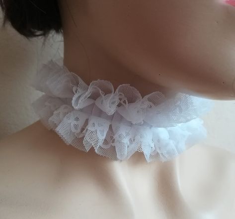 Ruffled lace collar, white lace ckoker.Handmade chic ruffled tulle collar. Organza ribbon ties  can be worn at the front or back of the neck detachable neck collar for women. approximate dimensions COLLAR:  wide 2" length 11- 12"  One size fits all.  adjustable with ribbon or please contact me for other sizes Please check your registered address on Etsy is up to date before purchasing  EXSPRESS SHİPPİNG:  need PHONE NUMBER Express shipping option available for countrys.You can see it when you buy and select your country We recommend you to send your phone number with a message in the fast cargo option. When the cargo does not find you on your adress. The product will not come back to me and it will be destroyed. The seller does not accept responsibility in this case The buyer is responsibl Tulle Collar, Clown Collar, Neck Ruffle Collar, White Lace Choker, Pierrot Clown, Ruff Collar, Lace Fingerless Gloves, White Chic, Lace Choker