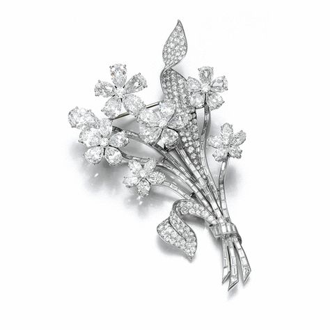 Diamond brooch, Bulgari, 1962. Designed as a floral spray, the flower heads set en tremblant, with pear- and marquise-shaped, brilliant and circular- cut, baguette and tapered baguette diamonds, signed Bulgari, three baguette diamonds deficient. Diamond Brooches, Royal Jewellery, Bulgari Jewelry, Magnificent Jewels, Titanic Jewelry, Tiaras Jewellery, Baguette Diamonds, Diamond Brooch, Floral Spray