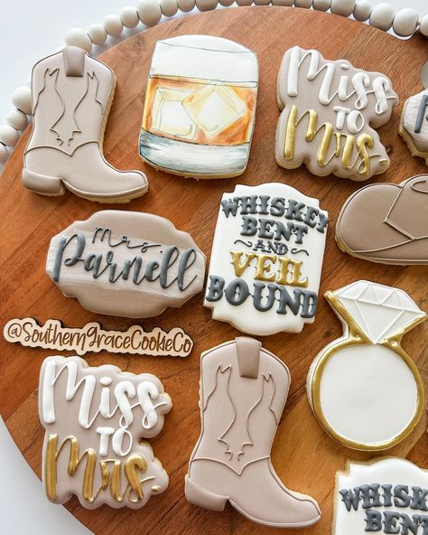 Whiskey Bent and VEIL Bound🥃💍 #decoratedsugarcookies #decoratedsugarcookie #decoratedsugarcookiesofinstagram #royalicing #royalicingcookies #royalicingart #royalicingflowers #royalicingtransfers #royalicingsugarcookies #walkerla #livingstonparish #louisiana #batonrouge #batonrougefoodies #louisianabaker #whiskeybentandveilbound #backelorettecookies #whiskeybentandveilboundcookies Whiskey Bent And Veil Bound Bachelorette, Bach Themes, Royal Icing Sugar, Royal Icing Flowers, Royal Icing Transfers, Southern Grace, Bachelorette Party Bride, Bach Party, Royal Icing Cookies