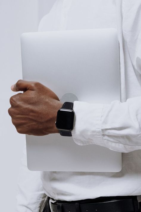 Classic black and white workwear styling! The black leather Apple Watch band compliments the black leather belt as a nice contrast against the relaxed-fit white shirt. A minimalist look that's hard to beat - it's all in the details!