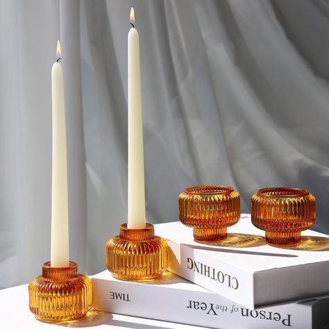 PRICES MAY VARY. [Vintage Candlestick Holder]: Taper candle holder has warm amber color and classic ribbed glass design, it holds the taper candle perfectly, which can be a nice table decoration for fall wedding. When lit the votive/tealights, it emits pretty golden glow through the optical glass, creating a warm atmosphere for the dinning table [Glass Candle Stick Candle Holder]: Versatile candle stick holder is premium and chic, thus it is an excellent decoration for Halloween, Thanksgiving, C Candle Stick Holders Decor, Taper Candle Centerpiece, Glass Taper Candle Holders, Dinner Table Centerpieces, Fall Wedding Tables, Glass Candlestick Holders, Dinner Table Decor, Dinner Decoration, Thanksgiving Centerpieces