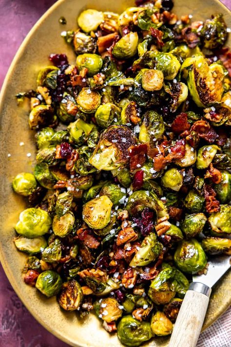 These easy to make Roasted Brussels Sprouts with Bacon come together with 10 minutes of prep time. The roasted brussels sprouts are paired with crispy bacon, toasted pecans and sweet dried cranberries, all coated in a maple dijon sauce. A perfect show stopping side dish for any meal! Maple Brussel Sprouts, Maple Bacon Brussel Sprouts, Yeast Pizza Dough, No Yeast Pizza Dough, Dijon Sauce, Crispy Brussel Sprouts, Brussels Sprouts With Bacon, Whole Wheat Pizza, Bacon Brussel Sprouts