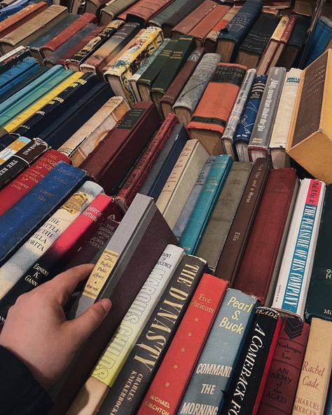 hand picking up a book in a book stack Book Fair Aesthetic, Downtown Boy, Fair Aesthetic, Custom Bookshelves, Book Haul, Dark Academia Fashion, Crystal Aesthetic, Academia Fashion, Boy Aesthetic