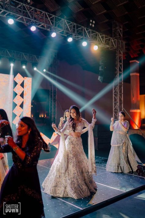 Photo of The bride dancing with her bridesmaids on sangeet Sangeet Songs, Indian Wedding Aesthetic, Bride And Bridesmaid Pictures, Ladies Sangeet, Sangeet Outfit, Lehenga Jewellery, Wedding Portrait Poses, Desi Wedding Decor, Indian Wedding Planning