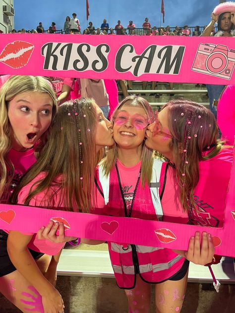 Pink Out Night Football, Barbie Football Posters, Pink Out Fb Game, Pinkout Ideas Outfits Football Game, Kiss Cam Football Game Poster, Pink Out Football Game Outfits Cheer, Pink Out Ideas For Football Games, Game Day High School, Fun Spirit Week Ideas High School