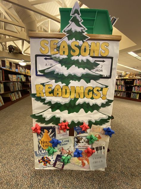 Sessions readings. Children’s end cap display. Winter book display. Library book displays. Christmas book display. Children’s books. Present. Tree. Library end cap. Christmas Book Fair Ideas, Winter Holiday Library Displays, Christmas Display Library, Library Christmas Tree Ideas, Library Tree Display, Winter Library Display Ideas, Library End Cap Displays, Christmas Book Display Library, Library Christmas Display