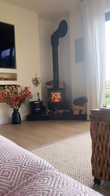 Corner Wood Stove With Tv, Corner Log Burner Living Rooms, Corner Stove Living Room, Corner Woodstove Living Room, Corner Wood Burner, Corner Log Burner Ideas, Wood Stove In Living Room, Corner Log Burner, Corner Fireplace Living Room