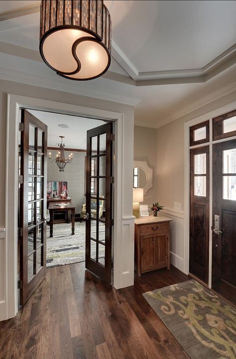 this makes me want to stain the french doors to our office. - love the dark doors with the white trim! Stained Trim, Dark Doors, Stained Doors, Brown Doors, Paris Grey, غرفة ملابس, White Doors, French Doors Interior, Design Light