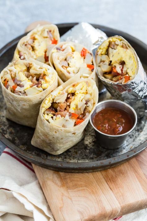 An easy make-ahead Breakfast Burrito Recipe. They go straight from the freezer to the microwave for a quick, nutritious breakfast.