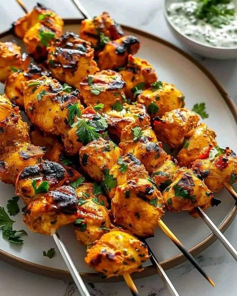 Grandma's Recipes | Grilled Tandoori Chicken Skewers | Facebook Chicken Breast Skewers Grilled, Tandoori Chicken Breast, Grilled Tandoori Chicken, Appetizer Board, Grandma's Recipes, Grill Recipes, Grandmas Recipes, Chicken Skewers, Plain Yogurt