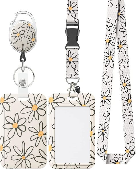 As a teacher, you're probably coming in to work with 4 bags. So you definitely dont want to be scavenging through all your bags for your keys! Uniclife Floral Sliding Badge Holder White Flower Plastic Case with Retractable Badge Reel Carabiner Clip and Detachable Lanyard Strap Hard Vertical Card Protector for Women Nurse Teacher Student Nursing Teacher, Women Nurse, Teacher Lanyard, School Supply Labels, Teacher Student, Carabiner Clip, Card Sleeve, Card Patterns, Quick Release Buckle