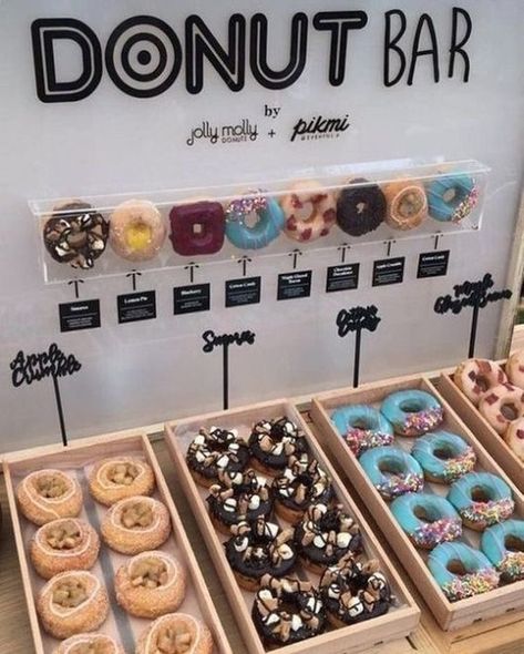 A Sophisticated Donut Display, Super Easy to Set Up! Do you Fancy one at your Event?. It's a great way to Demonstrate  your Edible goodies at an Event but also great for a Celebration 🎉 🥳 ⁠ ⁠ #Cocktail #Mocktails #Drinkstation #BarService #Wedding #Party #Birthdays #2020 #Bar #babyshower #bridalshowers #cocktailcompany #cocktails #mocktail #alcohol #parties #confectionaryservices #sweettables Doughnut Bar, Donut Walls, Party Food Bars, Dessert Display Wedding, Party Food Bar, Donut Display, Brunch Bar, Decoration Patisserie, Graduation Party Foods