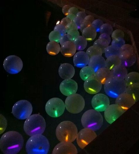 Glow Stick In Balloon, Pool Party Glow Sticks, Glow Sticks In The Pool, Pool Party Lights, Glow Stick Party Decorations, Galaxy Pool Party, Glow In The Dark Swim Party, Night Swim Party, Glowsticks In Pool