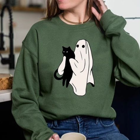 Ghost Black Cat Halloween Sweatshirt, Ghost Cat Halloween Hoodie, Halloween Gift for Cats Owner, Funny Halloween Sweatshirts,Halloween tees 👉Click to buy from Etsy Shop :🛒 https://www.etsy.com/listing/1534563152/ghost-black-cat-halloween-sweatshirt 📌Store Link in Bio Welcome to Turquoisefashionus! Its great to see you here! We prioritize one thing here and that is quality and customer satisfaction. Our hoodies and sweatshirts are super comfortable and the quality is very good. Unique... Holding A Cat, Turquoise Fashion, Ghost Cat, Halloween Hoodie, Cat Halloween, Sister Shirts, Mom And Sister, Black Cat Halloween, Halloween Tees