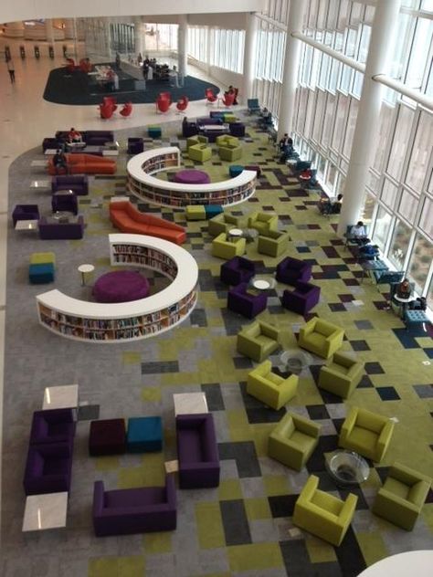 The James B. Hunt Library at North Carolina State University is a revolution in information storage. At the Hunt, robots fetch the books. Two million Meja Sofa, School Library Design, High School Library, Library Inspiration, School Interior, Library Furniture, Modern Library, Corporate Interiors, Library Decor