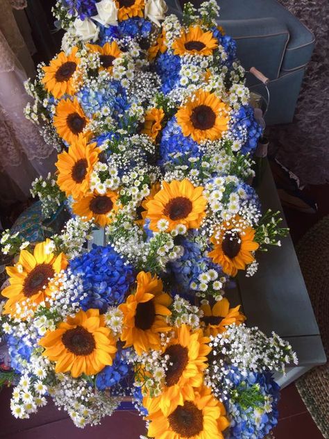 Love these bright summer bouquets featuring sunflowers, blue hydrangea and baby's' breath! Designed by Jen-Mor Florist, Dover, Delaware www.jenmor.com Blue Roses And Sunflowers Centerpiece, Sunflower And Blue Hydrangea Bouquet, Sunflowers And Blue Hydrangeas, Sunflower And Blue Centerpieces, Sunflower Hydrangea Bouquet, Sunflower And Blue Wedding, Blue Orchid Bouquet, Blue Sunflower Wedding, Port Renfrew