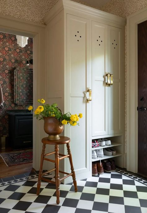 Built-in mudroom storage makes this space as functional as it is beautiful. See how the renovation was pulled off. Reading Loft, Rustic Entryway Table, Victorian Tile, Mudroom Makeover, Upper Kitchen Cabinets, Rustic Entryway, Kitchen Design Plans, St Paul, Wood Cabinets