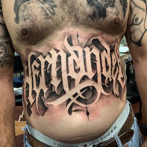 Stomach Lettering Tattoos Men, Self Made Tattoo Lettering, Chest Tattoo Fonts, Money Sign Tattoo, Chest Tattoo Lettering, Tattoo Nombres, Self Made Tattoo, 23 Tattoo, Hercules Tattoo