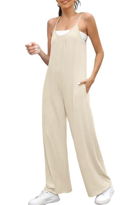 PRICES MAY VARY. Soft Material - Spaghetti strap summer jumpsuits crafted by 95% Polyester and 5% spandex, which is soft and comfortable, stretchy, lightweight and breathable. Trendy Features - Loose fit style one-piece Jumpers with side pockets, spaghetti strap and wide leg desgin deliver a sense of new fashion trendy look. Pefect for All Occasions - Loose-fit overalls jumpers with pockets is suitable for casual, daily life,travelling,vacation,beach, outdoor activity, shopping, office, party, s Summer Beach Jumpsuits And Rompers With Pockets, Casual Cotton Strapless Jumpsuit With Pockets, Casual Non-stretch Jumpsuits And Rompers For Summer, Cotton Jumpsuits And Rompers With Spaghetti Straps And Pockets, Summer Loungewear Jumpsuits And Rompers In Solid Color, Summer Cotton Overalls In Solid Color, Non-stretch Solid Color Summer Jumpsuits And Rompers, Sleeveless Summer Leisure Jumpsuits And Rompers, Sleeveless Summer Jumpsuits And Rompers For Leisure