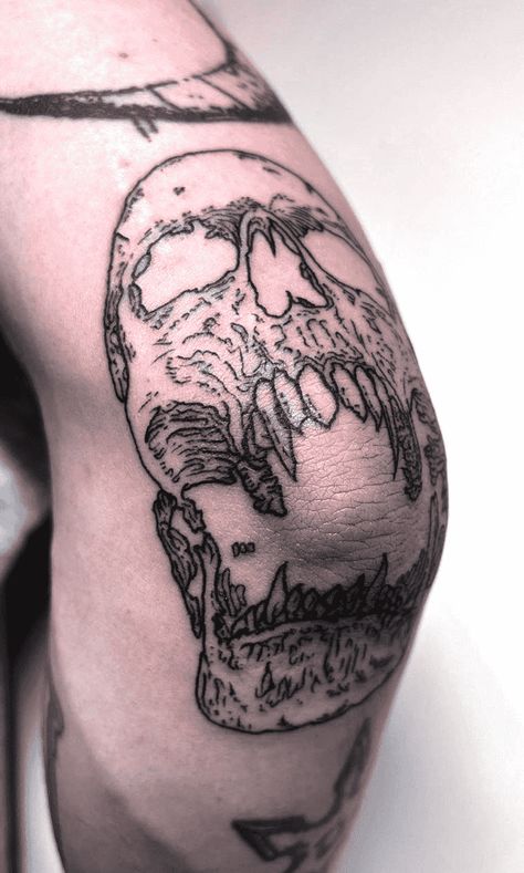 Unique Knee Tattoo Ideas, Wolf Elbow Tattoo, Best Elbow Tattoos, Skull Knee Tattoo Design, Skull Tattoo On Elbow, Skull Around Knee Tattoo, Skeleton Elbow Tattoo, Mens Horror Tattoos, Elbow Hinge Tattoo