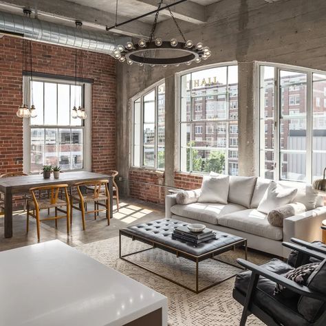 Urban Loft - Industrial - Living Room - Kansas City - by Gary Brown Homes LLC | Houzz Urban Industrial Living Room, Urban Loft Apartment, Concrete Floors Living Room, Wood Fireplace Surrounds, Loft Apartment Decorating, Urban Living Room, Green House Design, Brick Interior, Industrial Living