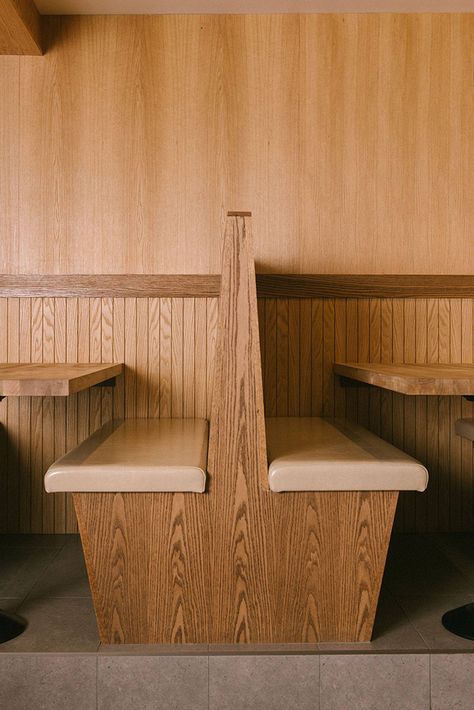 Ultra-muted cafe takes over former auto shop in British Columbia Banquette Restaurant, Restaurant Seating Design, Cafe Bench, Restaurant Booth Seating, Concept Restaurant, Restaurant Booth, Kitchen Banquette, Cafe Seating, Restaurant Seating