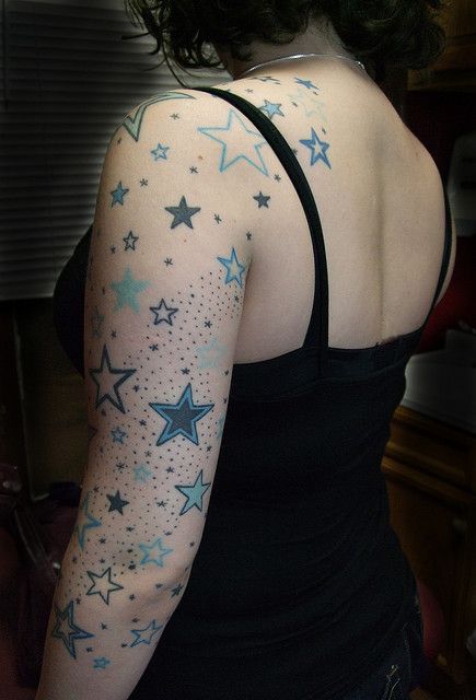 Love the stars...would make them less populated on the arm...but this is fantastic. Star Sleeve Tattoo, Star Tattoo On Shoulder, Woman Sleeve, Funky Tattoos, Girls With Sleeve Tattoos, Star Tattoo Designs, Back Of Shoulder Tattoo, Star Tattoo, Arm Sleeve Tattoos