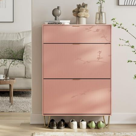 This pink diamond-shaped shoe cabinet is full of fashion in appearance. The simple and elegant color, exquisite metal legs, and luxurious golden metal handles all add a high-end atmosphere to this shoe cabinet, making it easy to adapt to any decoration style.Rotating flip drawers avoid the shortcomings of traditional push-pull drawers, are better dust-proof and have larger capacity. Shoe Organizer For Small Closet, Slim Entryway Cabinet, Hemmed Shoe Cabinet, End Cabinet Ideas, Shoe Entryway Storage, Cute Shoe Storage, Pink Closet Aesthetic, Narrow Hallway Storage, Condo Storage