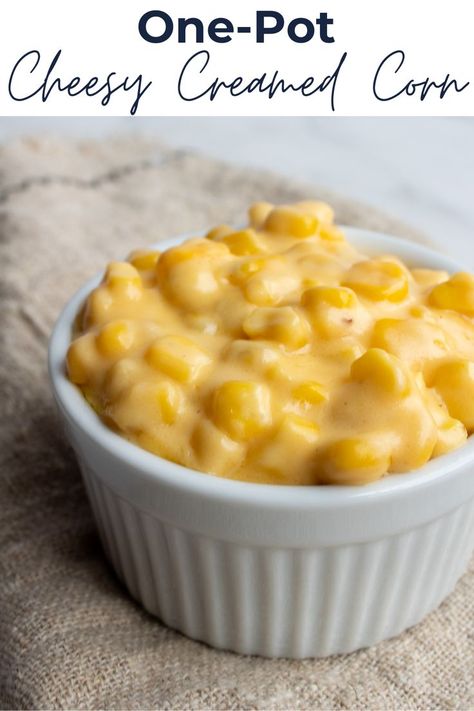 Cheesy creamed corn is in a ramekin with a spoon next to it. Cheesy Cream Corn, Cheesy Creamed Corn, Cream Corn Recipe, Corn Side Dish, Creamed Corn Recipes, Cream Corn, Cheesy Corn, Corn Recipe, Creamy Corn