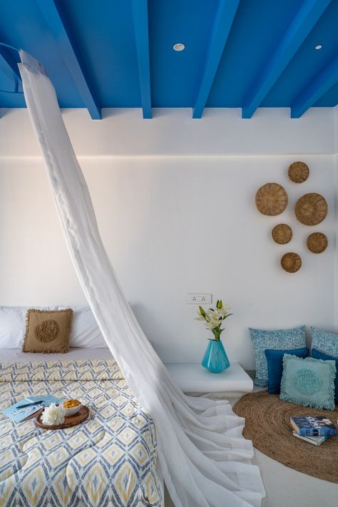 Santorini Style Themed Penthouse Interior In Pune | Between Walls - The Architects Diary Greek Inspired Home Exterior, Greek Mediterranean Decor, Greek Beach House Interiors, Santorini Bedroom Ideas, Santorini Inspired Bedroom, Greek Decor Interior Design, Greek Bedroom Decor, Greek Home Interior, Greek Inspired Bedroom