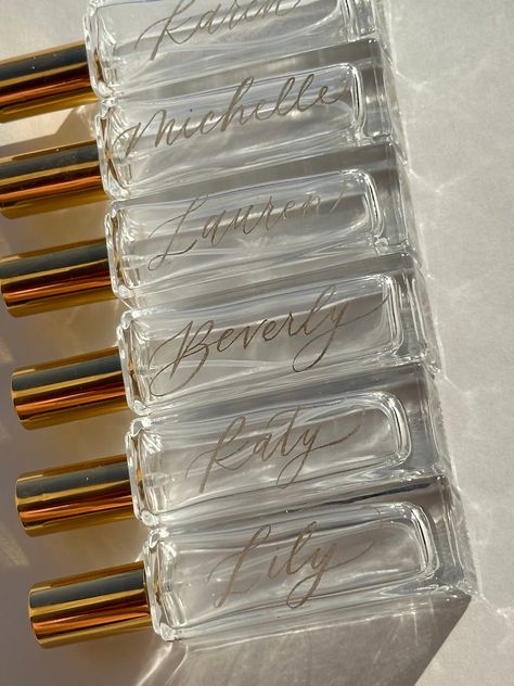 These custom engraved refillable perfume bottles are made to order for the special women in your life! They make great gifts for your bridesmaids and is something that they will hold on to you for long after your special day. They also make great stocking stuffers, party favors, and are the perfect travel size if you want to gift yourself a little something for your next vacation.  1 oz/30 mL 4.4in x .9 in x 3.1 in Custom Bridesmaid Gifts, Bachelorette Gift Ideas For Bridesmaids, Bridesmaids Bachelorette Gifts, Gift Favors Ideas, Bridesmaid Bachelorette Gifts, Day Of Bridesmaid Gifts, Bridesmaid Wedding Gifts, Wedding Party Gift Ideas, Engraved Perfume