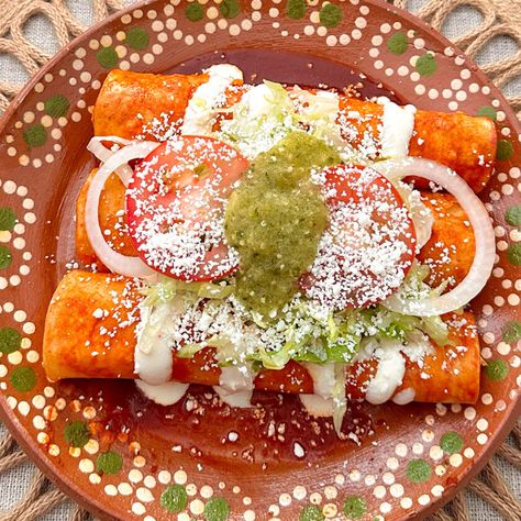 You’ve likely had chicken enchiladas before, but you’ve never had Abuela Yolanda’s authentic Enchiladas Rojas. Do yourself a favor and taste why Authentic Enchiladas, Enchiladas Rojas, Cotija Cheese, Chicken Enchilada, Fresh Oregano, Enchilada Sauce, Corn Tortillas, Chicken Enchiladas, Cooking Oil