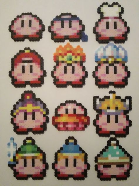 Mini Kirby Perler Bead Sprites by OCBeadSprites on Etsy: Easy Perler Beads, Perler Bead Crafts, Perler Beads Ideas, Pokemon Bead, Hamma Beads Ideas, Easy Perler Bead Patterns, Perler Creations, Pixel Beads, Pearl Beads Pattern