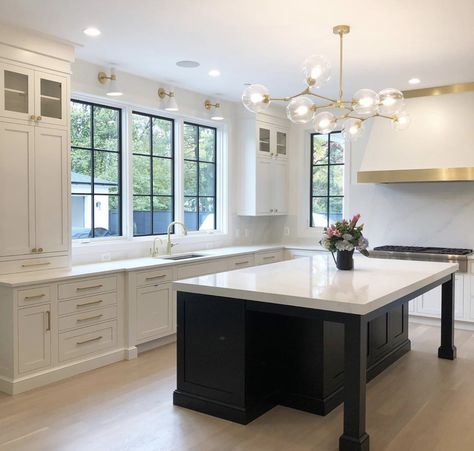 White Cabinets Espresso Island, Dark Cabinet White Appliances, Espresso Island Kitchen, Tall Kitchen Cabinets With Glass Doors, Cream Kitchen Cabinets With Black Island, Brown Island White Cabinets, Kitchen Cabinets With Glass Doors On Top, Dark Brown Island, Black Bottom Cabinets