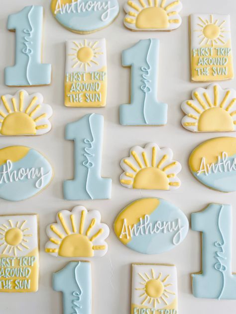 First Year Around The Sun Birthday Cookies, Sunny One Birthday, One In The Sun Cookies, Sun Themed First Birthday Party, Golden First Birthday Boy, Sunshine First Birthday Boy, One In The Sun First Birthday, Sun Sugar Cookies, Sun Cookies