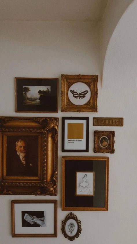 Dark Academia Framed Pictures, Feature Wall Ideas Photos, Gallery Wall Antique Paintings, Vintage Photos Gallery Wall, Black And White Photo Gold Frame, Black And Gold Frames On Wall, Gold Frame Gallery Wall Bathroom, Gold Frame Gallery Wall Vintage, Gold Wall Gallery