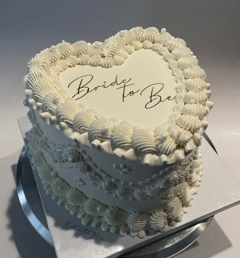 Bride to Be 💍🤍 (8 inch - regular) . . . . . #engagementcake #bridalshowercake #bridalshower #bridetobecake #bridetobe #engagementparty #weddingcake #whitevintagecake #whiteheartcake #vintageheartcake Cakes For Bridal Showers, Bride To Be Cupcakes Design, Bridal Shower Ideas Cake, Simple Bride To Be Cake, Bride Shower Ideas, Bride To Be Party Decoration, Bride To Be Cakes Ideas, Bride To Be Decoration Ideas, Bride To Be Ideas