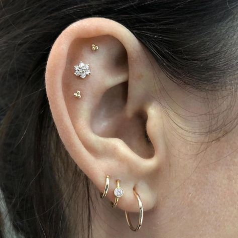 MARIA TASH on Instagram: ““[The Curated Ear®] is a collection of layered pieces of jewelry that go up the ear that are intended to flatter the wearer, work with…” Triple Lobe Piercing, Opal Belly Ring, Curated Ear, Gold Belly Ring, Pretty Ear Piercings, Cartilage Jewelry, Maria Tash, Cute Ear Piercings, Navel Jewelry