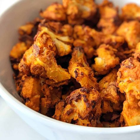 Frozen cauliflower in the air fryer has never tasted so good! With an easy buffalo sauce and a few minutes you'll have yourself an incredibly flavorful side dish or snack. It's perfect for busy weeknights yet fancy enough to impress guests and serve for a party or potluck! Cauliflower In Air Fryer, Easy Buffalo Sauce, Side Dishes Air Fryer, Air Fryer Easy, Small Air Fryer, Frozen Cauliflower, Wfpb Recipes, Light Meals, Buffalo Cauliflower