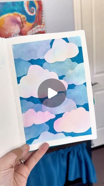 Andrea Nelson on Instagram: "This technique is called negative space painting or reverse painting, and once you understand the concept, there are so many ways to use it! Earrings are from  @meesh_made 

Supplies are my brand and are on my page:
Watercolor sketchbook 
24 color essential palette
Size 6 and 8 round brushes
1 inch flat brush
Artist tape 

#learnwatercolor #negativespacepainting #reversepainting #cloudpainting #easyart" Negative Space Painting, Andrea Nelson Art, Negative Painting, Watercolor Painting For Beginners, Reverse Painting, Artsy Ideas, Learn Watercolor, Space Painting, Watercolor Pictures