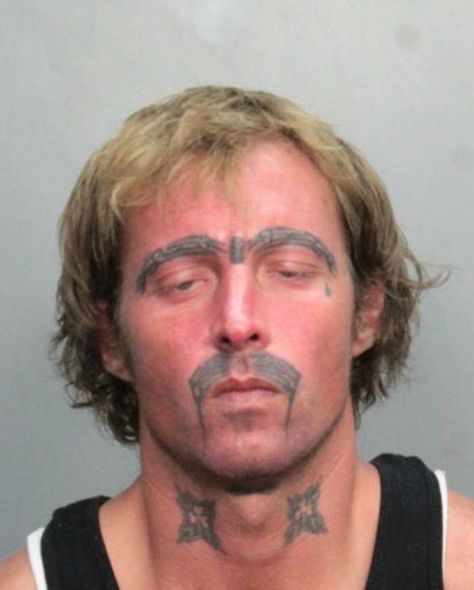 Scary, yet sorta sad at the same time. #inked #inkedmag #tattoo #eyebrows #mustache #ink #mugshot #face #inmate Bad Face Tattoos, Mustache Tattoo, Black Ink Tattoo, Tattoos Gone Wrong, Funny Mugshots, Horrible Tattoos, Terrible Tattoos, Growing Facial Hair, Tattoo Fails