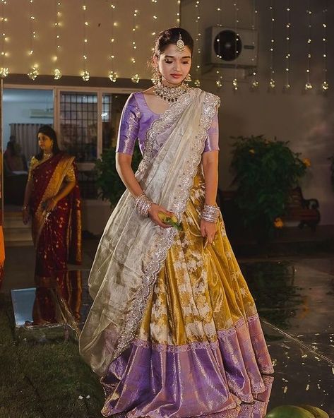 Leave a little sparkle where ever u go ✨ @sahaja93 looking graceful and elegant in our lustrous golden Kalidar lehenga. #parvathidasari… Pattu Langa Voni Half Saree, Langa Voni Half Saree, Half Sari, Kalidar Lehenga, Half Saree Function, Langa Voni, Lehenga Saree Design, Half Saree Lehenga, Long Gown Design